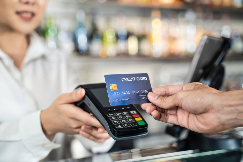 close up of customer hand using dummy credit card 2023 11 27 05 28 34 utc