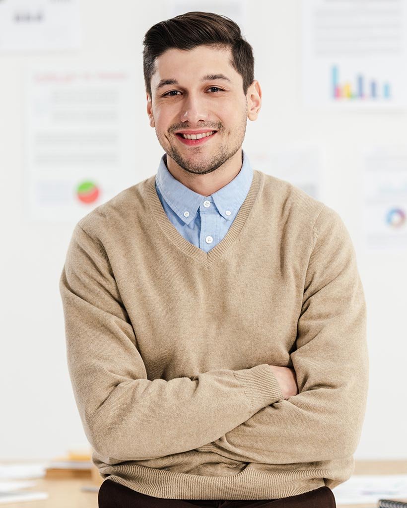 portrait of smiling marketing manager with arms cr 2022 12 16 16 16 02 utc